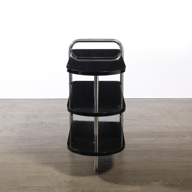 This stunning Art Deco side table, model no. 806, designed by Wolfgang Hoffmann for Howell during the 1930s, epitomizes...