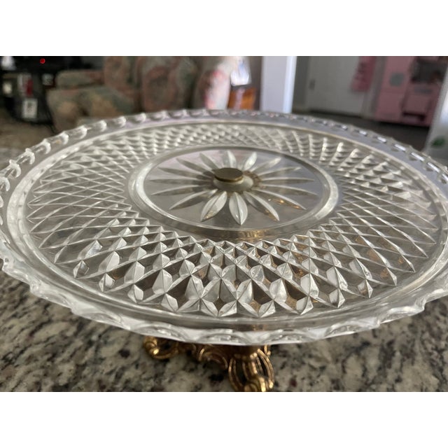 Cake Stand in Glass with Claw Pedestal and lace design with a star center.