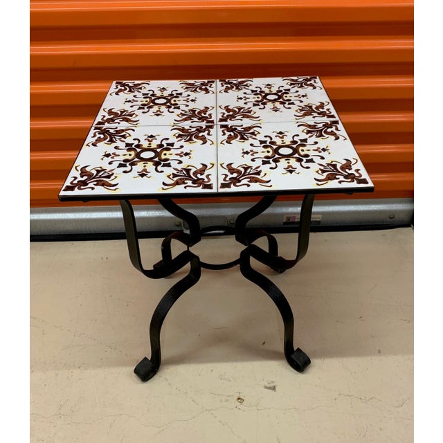 Mediterranean Tile Table on Black Iron Base Chairish