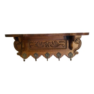 Wall Shelf With 5 Brass Figural Coat Hooks For Sale