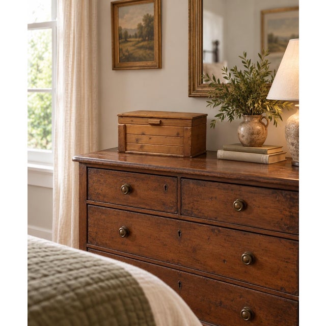 Handcrafted cedar keepsake chest box featuring warm natural wood tones, clean rustic lines and a hinged lift-top lid....