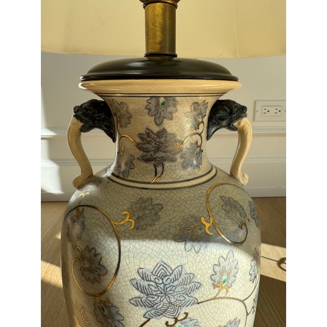 Elegant, heavy and near-pristine matched pair of hand-decorated porcelain urn table lamps by Frederick Cooper, Chicago....