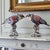 A beautifully preserved pair of Mottahedeh parrots from the Williamsburg Collection, crafted in Italy in 1998 and finished...
