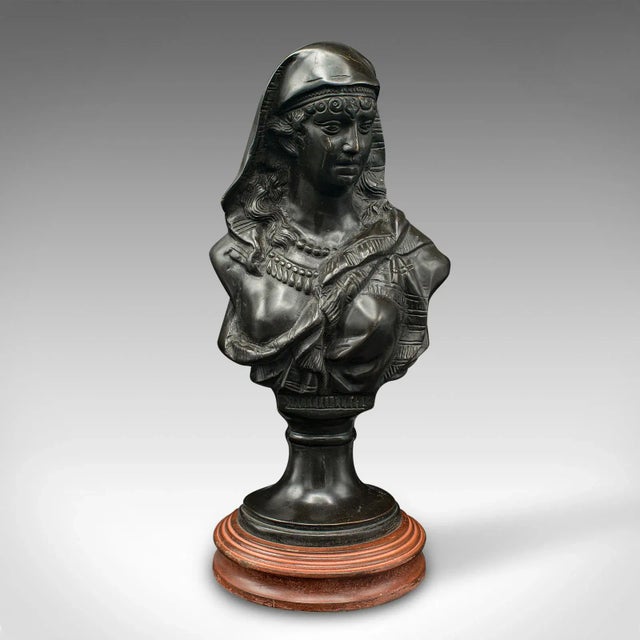 This is an antique portrait bust. A French, decorative bronze female statue, dating to the late Victorian period, circa...