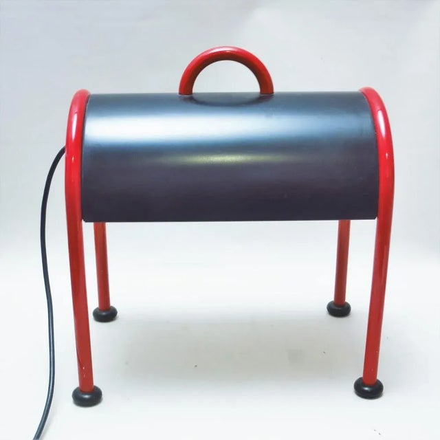 Lampe Suitcase by Ettore Sottsass for Stilnovo, 1970s, in Very Good conditions. Designed 1970 to 1979 This piece has an...