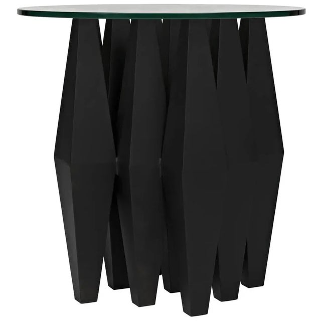 Two elemental materials meet in this boldly designed accent table. The base is formed of multiple geometric legs, and the...