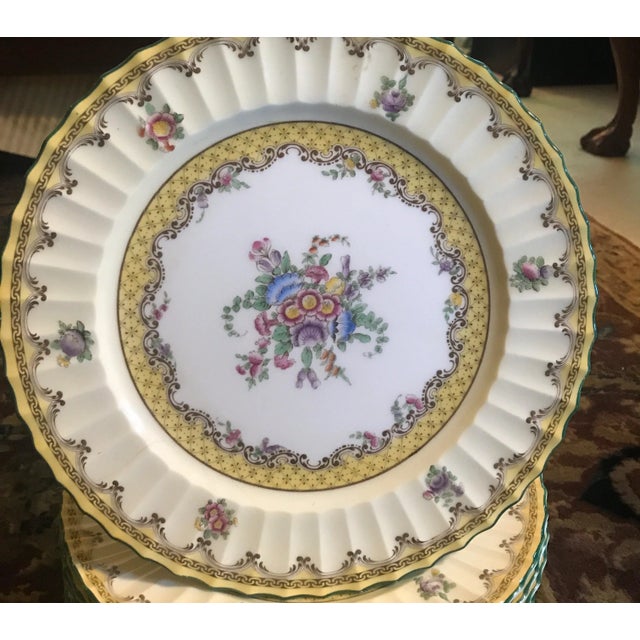 A set of 12 English Royal Worcester floral service plates titled Willoughby. The set was made in the early 1930s and was...