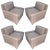 This set of four armchairs features grey felt upholstery and was produced in the UK.