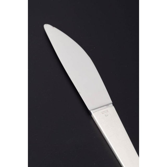 Henning Koppel for Georg Jensen, lunch knife Caravel. Lunch knife in stainless steel and sterling silver in the Caravel...