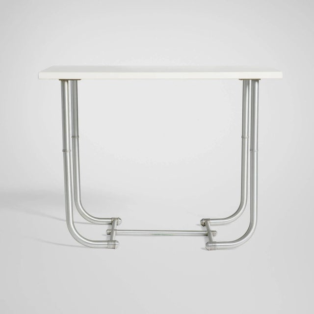 Warren McArthur Console Table 1933, Warren McArthur Corporation, Rome, New York Model 1551 Aluminum frame with laminate...