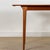 Designed in the 1960s by Tom Robertson for A.H. McIntosh of Scotland, this exquisite dining table hails from the esteemed...