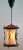 Forged and ribbed glass pendant lamp. Materials: Ribbed glass globe lampshade. Black painted curved iron slats pleated as...