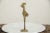 :: Vintage handmade African bronze long legged bird. Circa mid 20th century and possibly older, each figure in this...
