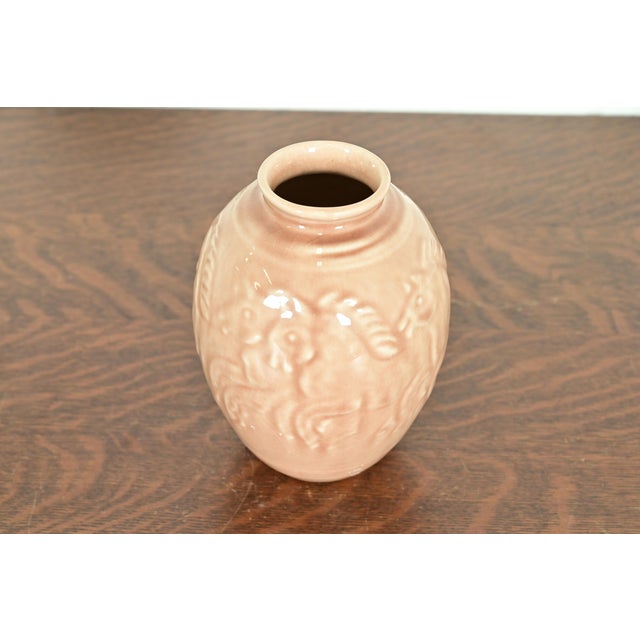 A gorgeous Arts & Crafts or Art Deco period glazed art pottery vase with low relief decoration of horses By Rookwood...
