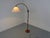 Adjustable teak floor lamp by Domus. Height from 130 cm to a maximum of 160 cm. This piece has an attribution mark, I am...