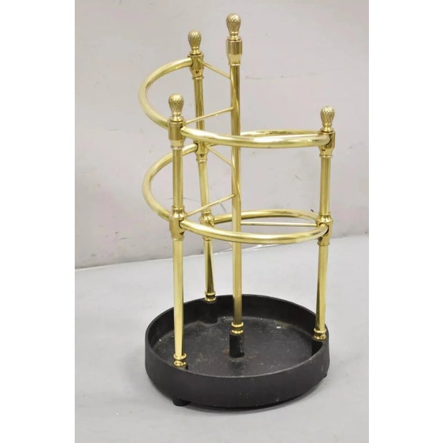 Sarreid LTD Victorian Style Polished Brass & Heavy Cast Iron Spiral Umbrella Stand. Circa late 20th Century Measurements:...