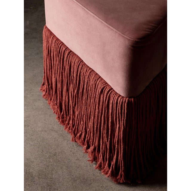 Charged with the hushed allure of tassel and texture, the Allard Ottoman couples comfort and sophistication with...
