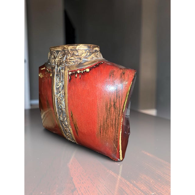 Bring a touch of timeless Oriental elegance to your home with this stunning, unique figural ceramic vase. Expertly shaped...