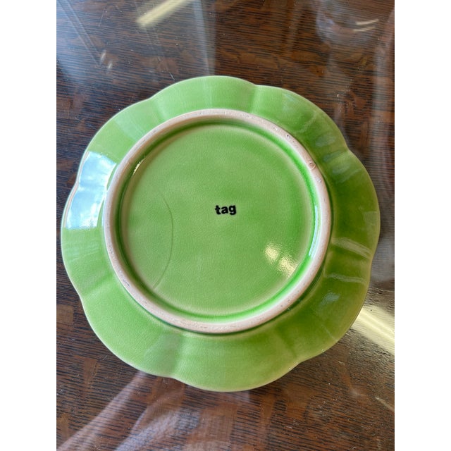 1970s Green Ceramic plate with scalloped edges. Measures 9” in diameter. Use as display or to serve food. Made by Tag Ltd....