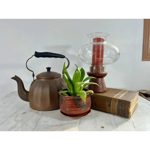 Vintage copper tea kettle. Made in Germany. The tin inside looks to be in good usable condition. However, I am not an...