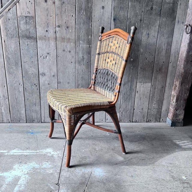 Vintage wicker and bamboo bedroom chair High back with detail and cane seat with 2 tones of wicker Detailed Condition Good...