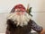 This charming folk art Santa Claus, handmade by artist Paul Gordon, is sure to add character to any seasonal display. The...