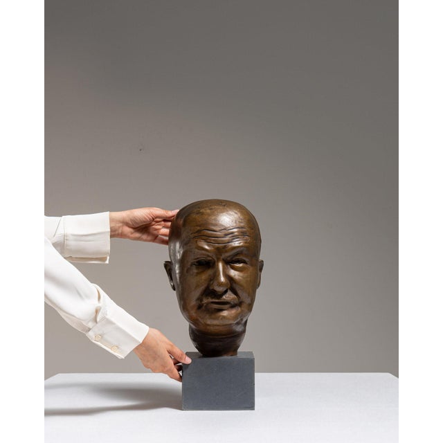 This early 20th century sculpture from Belgium is finished in chocolate, worked in bronze. Its form follows honest, well-...