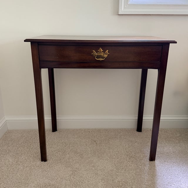 Kittinger Side Table Simple mahogany table easy to place beside a chair or beside a bed. 29” x 16” x 28”