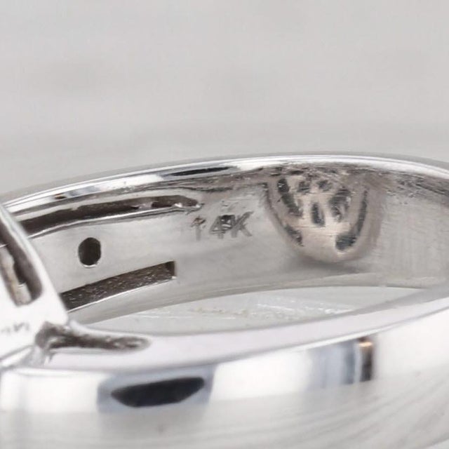 Gemstone Information: - Natural Diamonds - Total Carats - 1ctw Cut - Round Brilliant 0.45ctw & Baguette 0.55ctw Color - G...