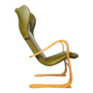 Mid 20th Century Wingback Cantilevered Lounge Chair by Gustav Axel Berg For Sale