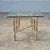 This vintage organic modern McGuire attributed dining table measures 36" square and 28.75" tall. The dining table features...