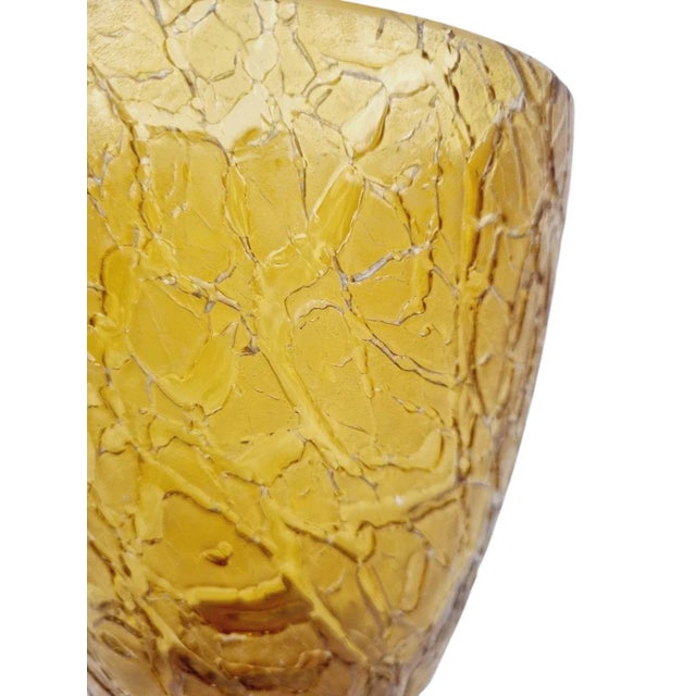 A charming vintage glass vase from the 1940s with a mellow amber colour and acid etched finish. Dimensions: 18x14x14 cm,...