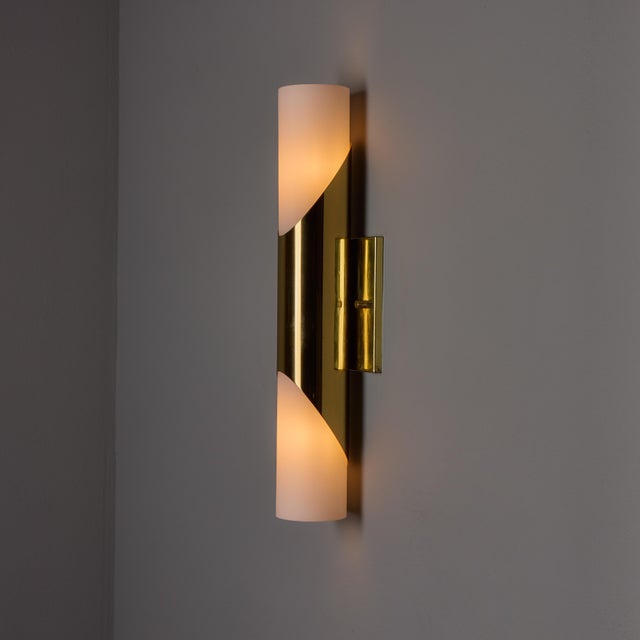 Pair of 1960s Neuhaus Leuchten Glass and Brass Sconces By Rolf Krueger Executed in brass-finish metal with tubular frosted...