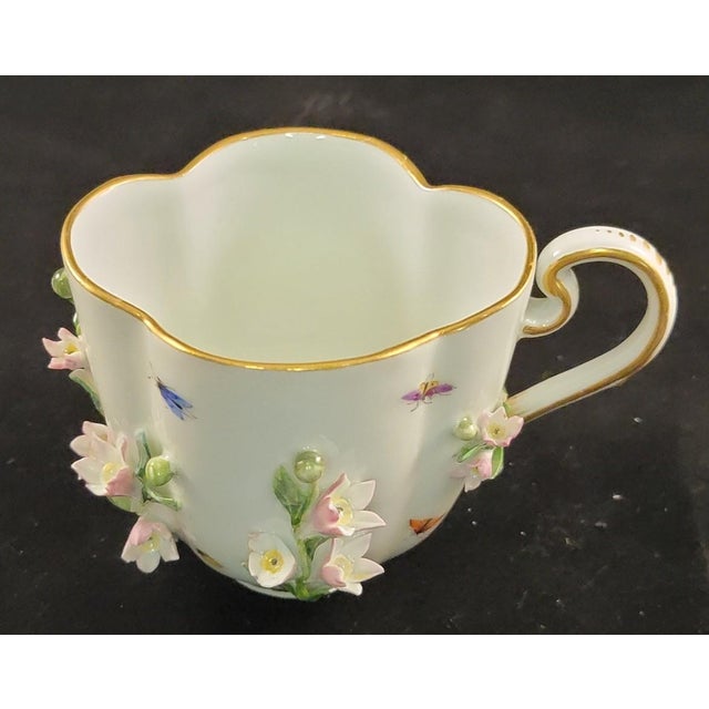 Mid-19th Century Meissen Porcelain Tea Cup & Saucer with Encrusted Flowers and Hand Painted Insects, however, it is very...