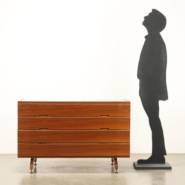 4-drawer chest of drawers, mahogany veneer, legs with adjustable feet. This piece is attributed to the mentioned...