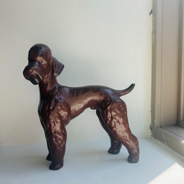 Adorable brown poodle figurine. Vintage I believe from the mid 21th century. Could not find markings looks similar to some...
