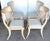 Tell me about this Set of four neoclassical grey and White Polychromed Klismos Chairs, late 20th century. The backrest has...