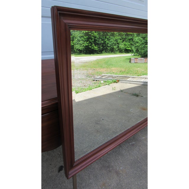 Item: Henkel Harris Mirror Details: Great Molding Traditional Design Signed Henkel Harris Cherry Measurements: 52.5" long...