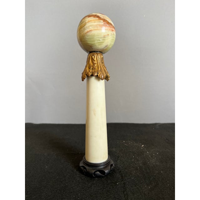 Combined with antique elements, neoclassical inspired table article, white marble column with specimen sphere, gilt bronze...