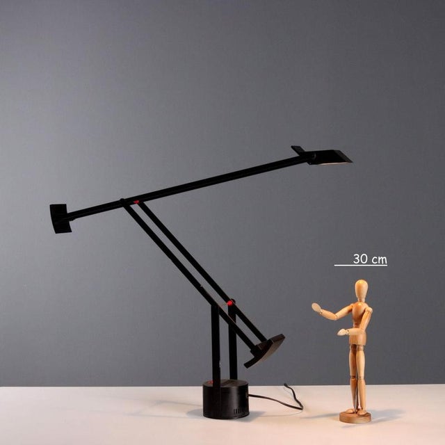 Table lamp with adjustable head and arms balanced by counterweights, designed by Richard Sapper for an Artemide...