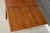 Refinished 71” to 126” Danish Modern Teak Draw Leaf Dining Table For Sale - Image 9 of 11
