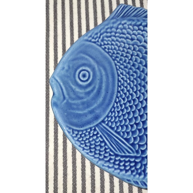 Add a touch of coastal charm to your table with this vintage Olfaire Majolica fish plate. Featuring a beautifully sculpted...