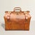 Some luggage suggests travel. This one suggests you have somewhere worth going. Made in England in the 1970s by Tanner...