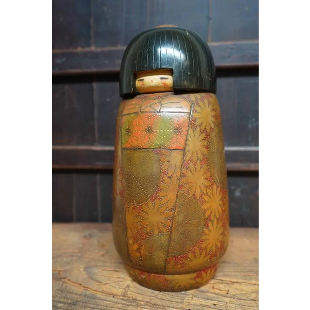Beautifully crafted kokeshi doll made by the renowned kokeshi artist Inosuke Kobayashi. Dimensions: height 34 cm, diameter...