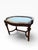 This antique Irish dressing table stool is a beautifully detailed piece, likely crafted in the early 20th century and...