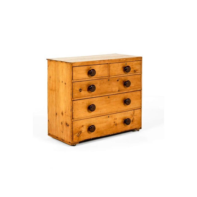 A charming victorian chest of drawers with an arrangement of two short over three long graduating drawers. The chest has...