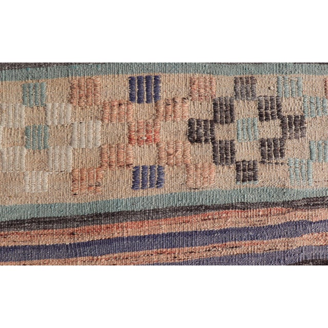 Measures: 3'1 x 5'7 Stripe design Turkish vintage flat-weave rug in light green, purple, and peach. Keivan Woven Arts /...