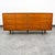 Outstanding BP John 9 drawer dresser / credenza in walnut. Very nice construction, great details. Comes with 9 drawers...