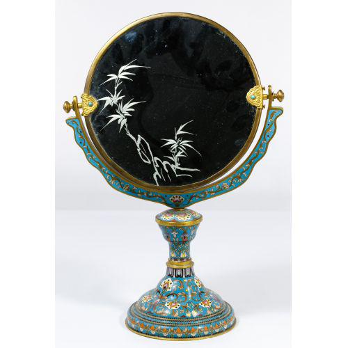 Chinese vanity mirror adorned with floral cloisonné enamel Chinese, early 20th century This strikingly beautiful vanity...