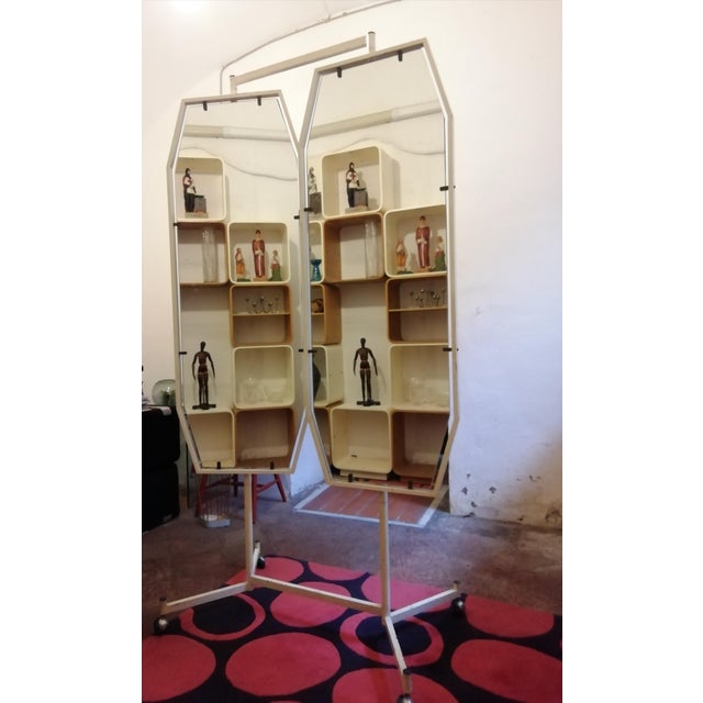 Mirror of Atelier Sant 'Ambrogio and De Berti. They are two large mirrored crystals mounted on a frame with wheels....